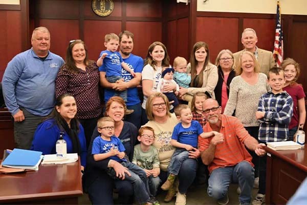 Geiman Family celebrating adoptions at courthouse